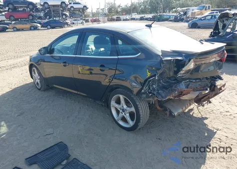 2013 Ford Focus Titanium z USA, uszkodzony, nr VIN 1FADP3J23DL233377